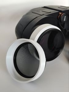 Custom made polarizating lens cap filter on binoculars